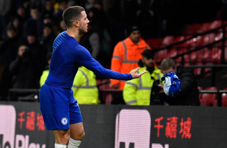  Eden Hazard throws his shirt into the crowd after a 2-1 win at Watford