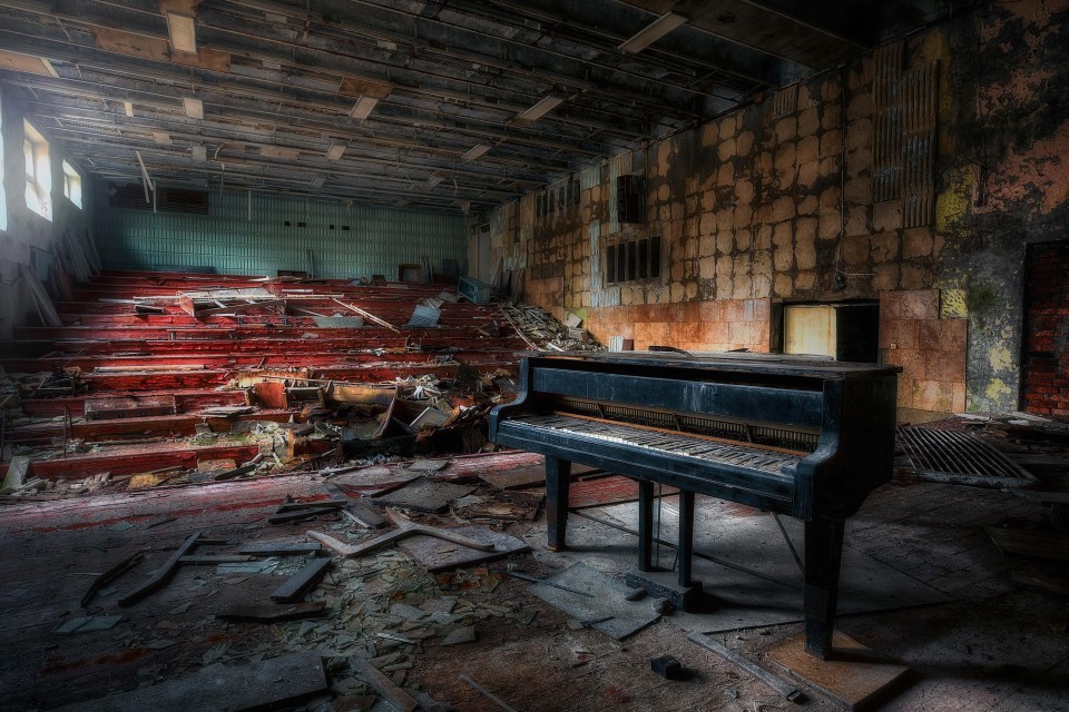 There is a still a piano on a crumbling stage