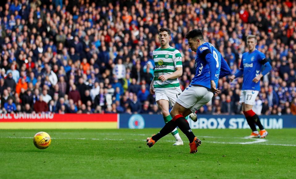 Ryan Jack slots home the opening goal on 31 minutes to put Rangers ahead against Celtic