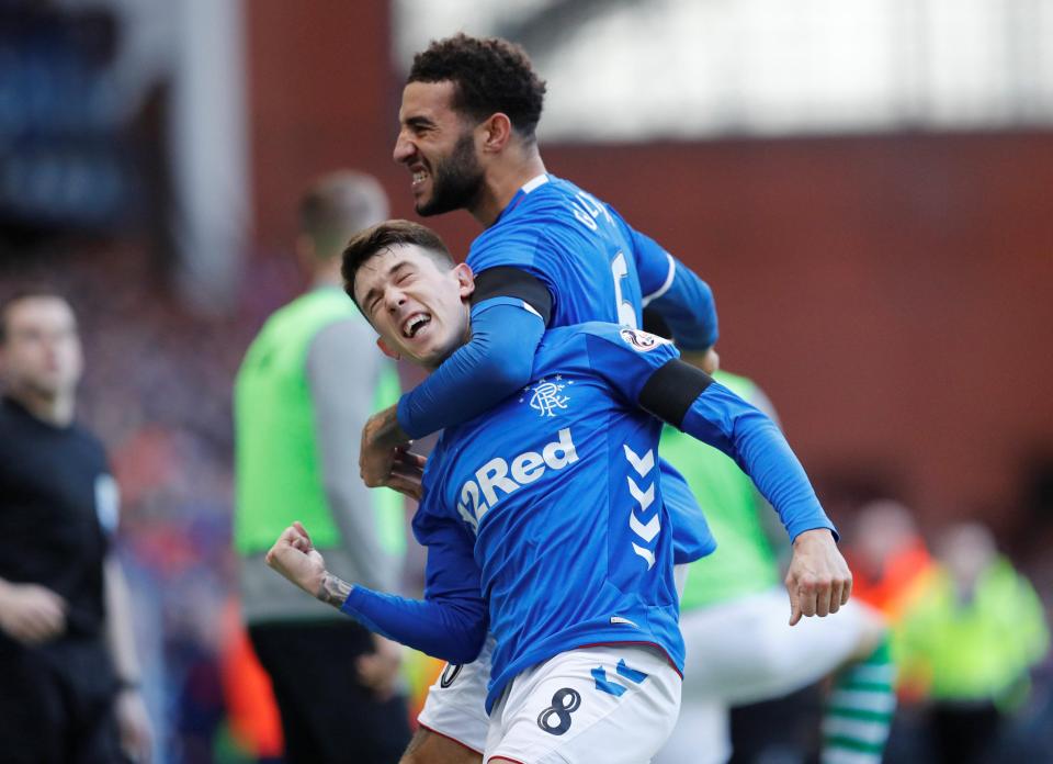 Jack is mobbed after opening the scoring in the Old Firm clash at Ibrox