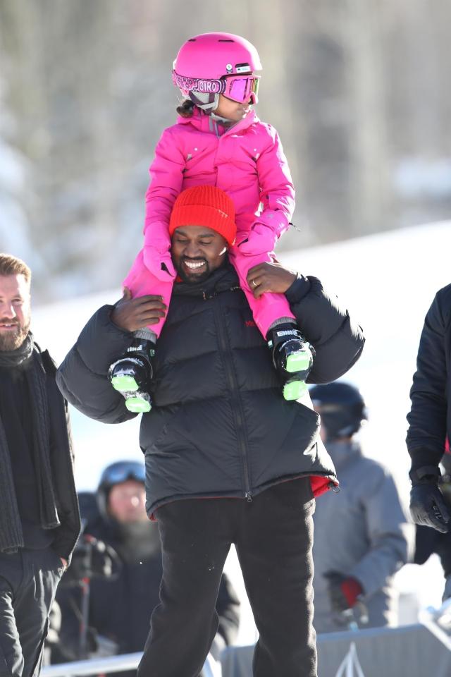  A grinning Kanye - which is not something we often get to write - hoisted North up onto his shoulders