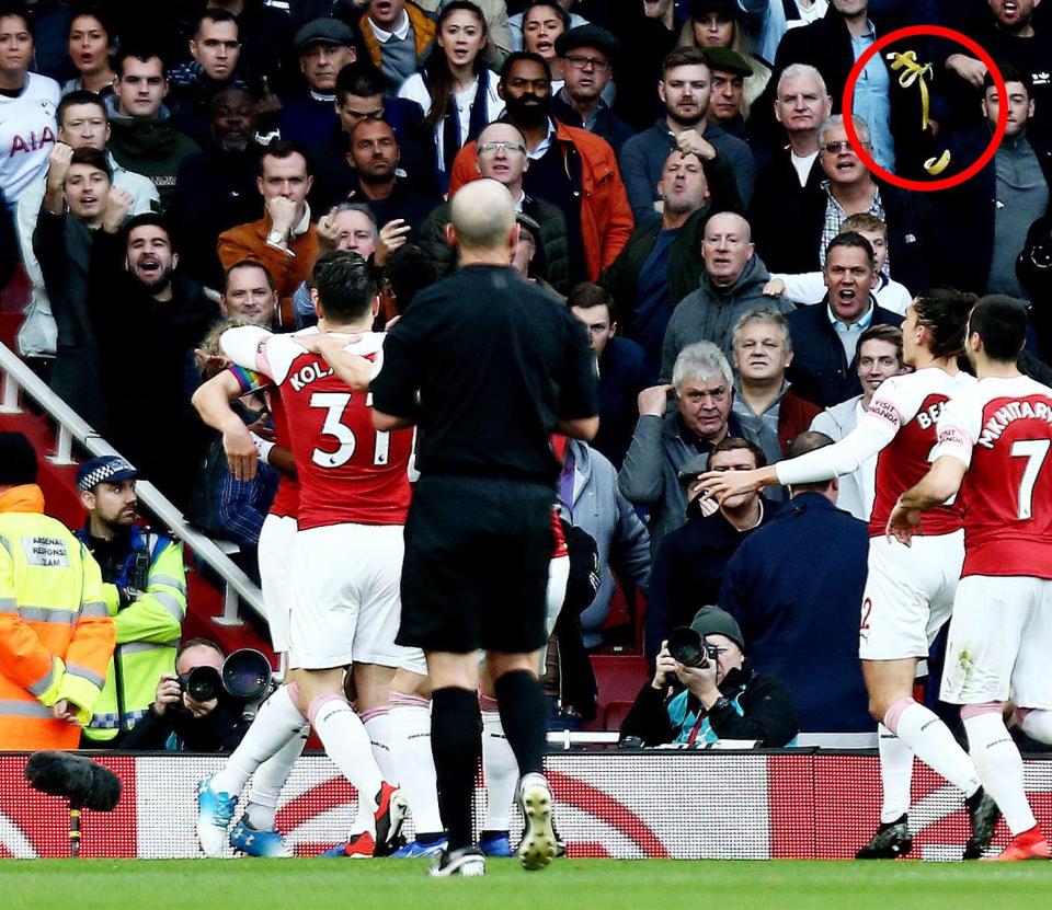  The moment a banana skin is thrown at Arsenal's Pierre-Emerick Aubameyang by a fan not in the picture