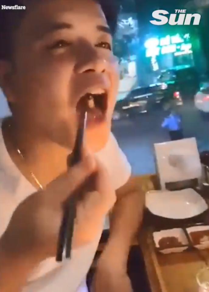  A gross video shows pals enjoying the wriggling delicacy on a night out