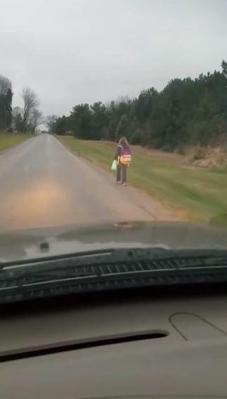  Matt Cox's unhappy daughter can be seen on the long trudge to school in Ohio, America