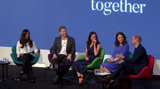 The body language guru pointed out Kate swings her chair away from Meghan to laugh directly at her husband