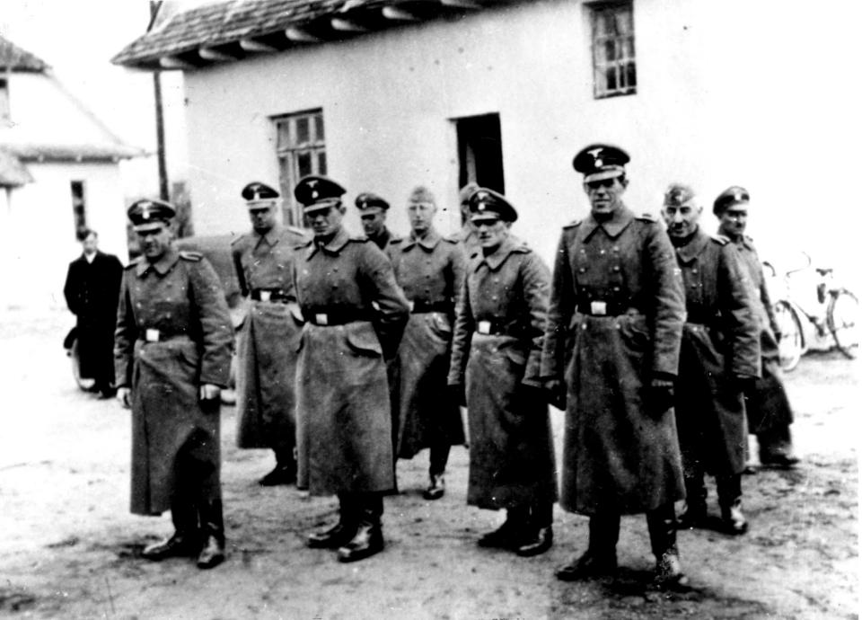  Nazi guards pictured at the Belzec death camp in German-occupied Poland, 1942