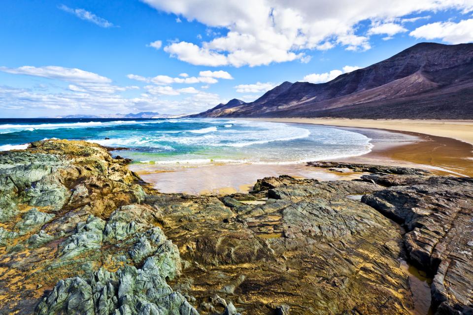 Fuerteventura is home to 150 stunning beaches where you can try water sports or just sunbathe and enjoy the view