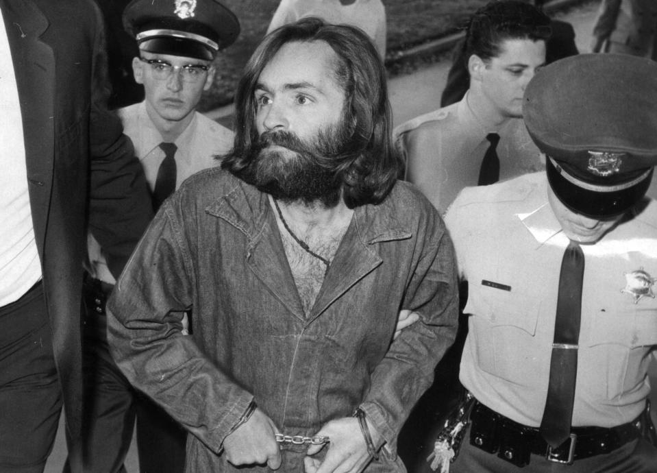  Charles Manson is escorted to court in December 1969 in Los Angeles