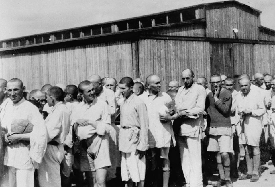  Jewish men who have been selected for forced labour await further processing at Auschwitz