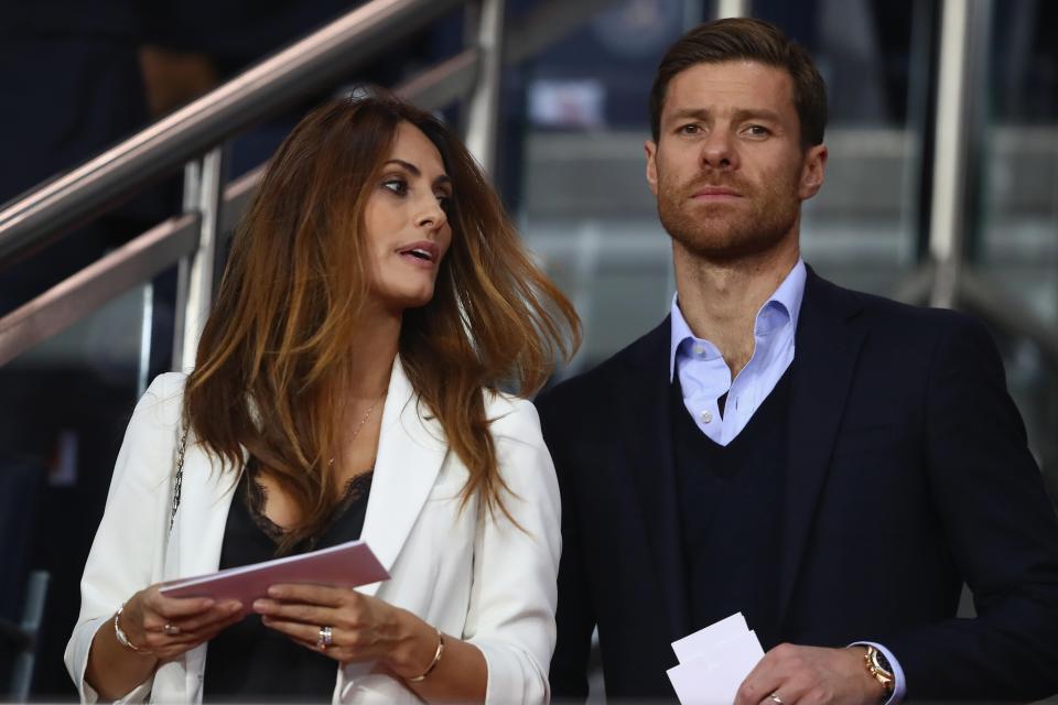  Xabi Alonso, pictured with wife Nagore Aramburu, is going to court in a bid to prove his innocence over tax fraud claims against the Spanish Government