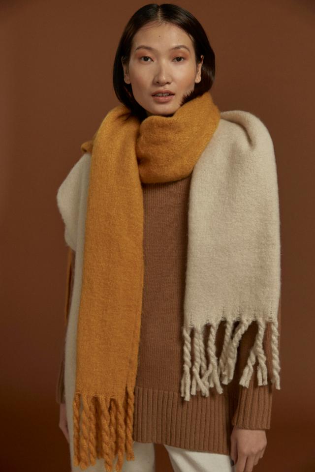  TIP: When one scarf just isn’t enough – cosy up in layered knits