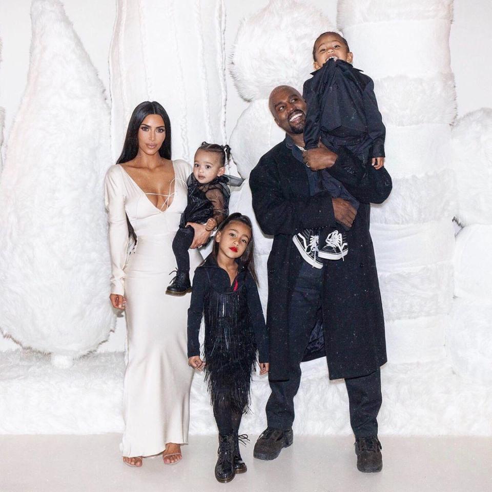  Kim Kardashian with Kanye West and children