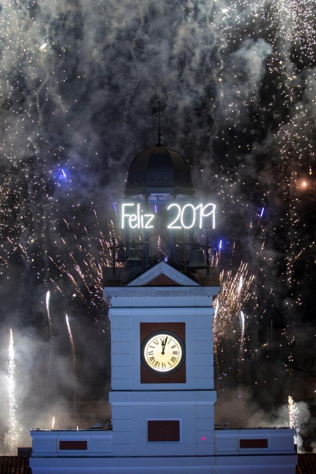  The clock of the Puerta del Sol rings at midnight to say good bye to welcome in 2019