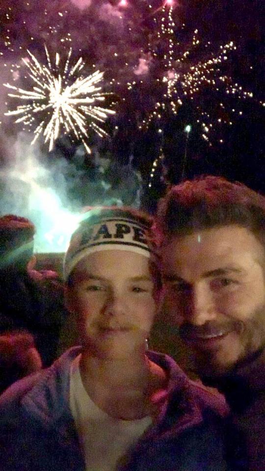  The footballer and son Cruz posed in front of the fireworks too