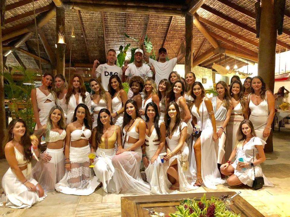  Neymar posed alongside 26 women during a New Year's party in Brazil