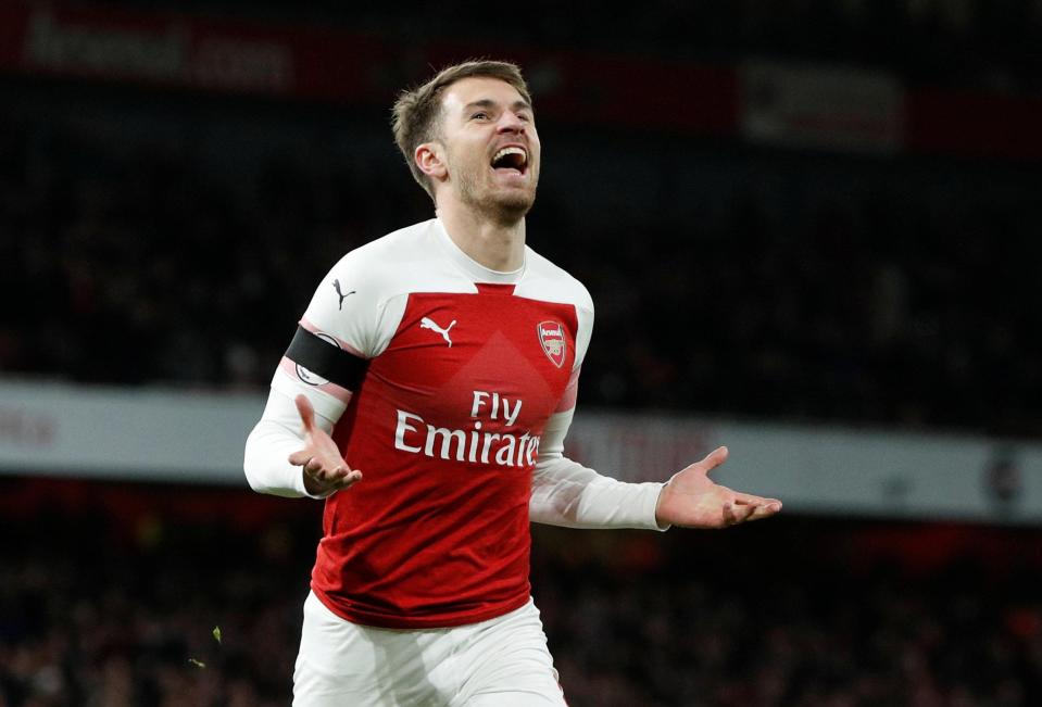  Aaron Ramsey celebrates after coming off the bench to score Arsenal's third