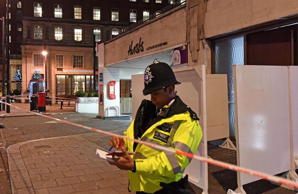  Cops stand on guard around the scene in Mayfair after Tudor Simionov was brutally stabbed to death