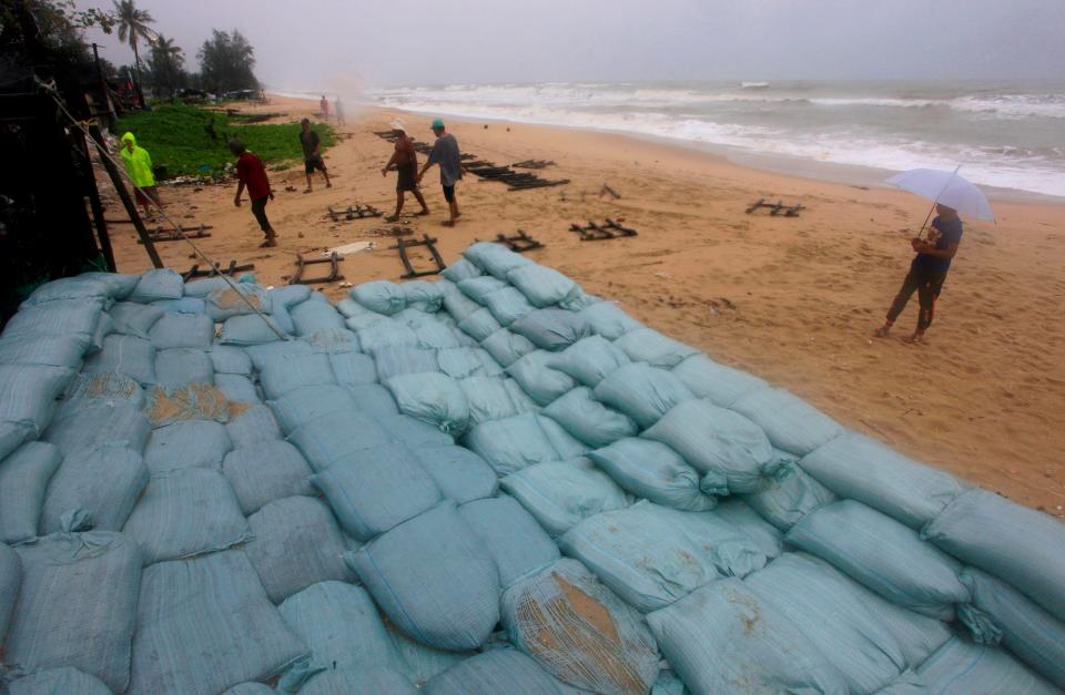  A sandbank has been built to protect properties on Songkhla as the tropical storm approaches