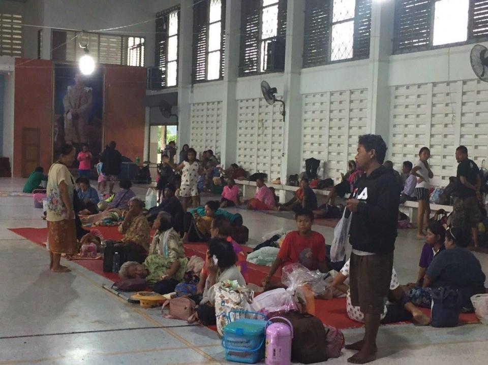  Residents take shelter at an evacuation centre in Nakhon Si Thammarat in the south of the mainland