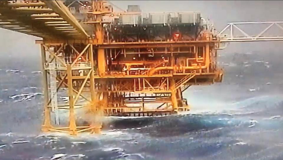  An oil rig in the Gulf of Thailand is battered by the raging winds