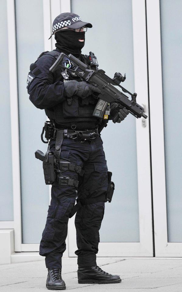  Armed cops were posted outside Liverpool Crown Court during the trial