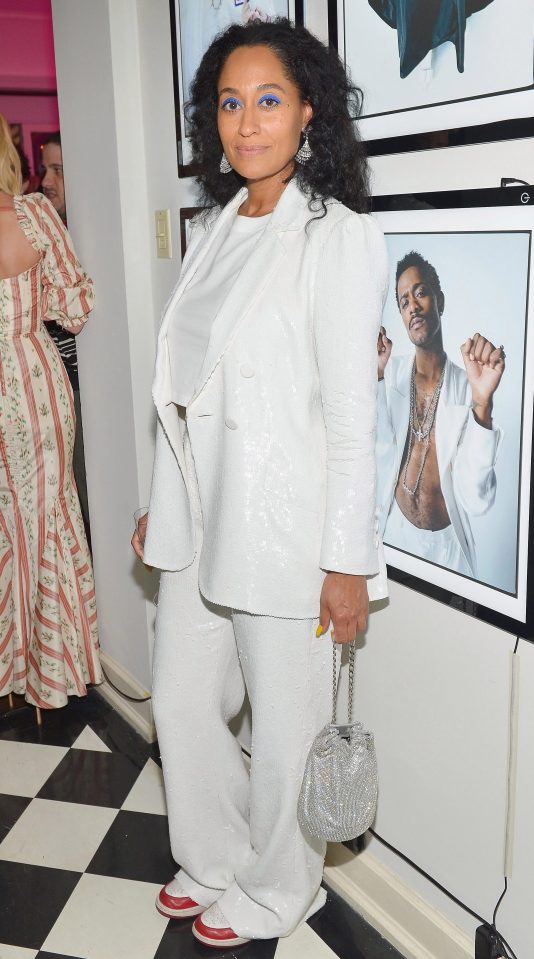  Tracee Ellis Ross donned a white sequin suit for the event