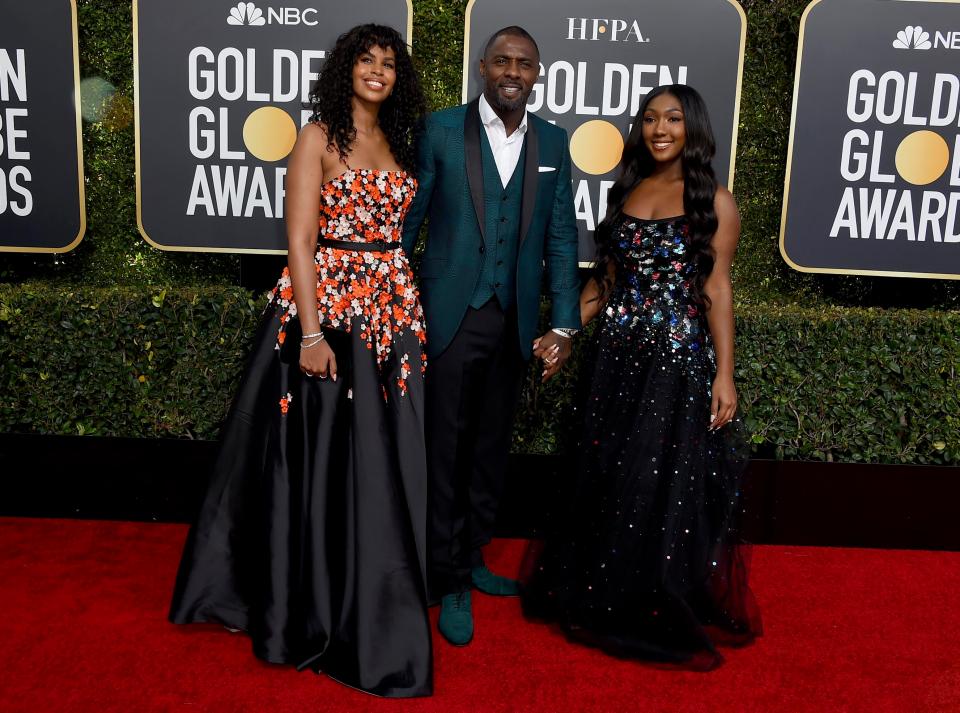  The couple arrived with Idris' daughter, Isan