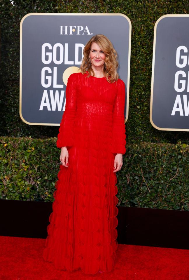  Laura wore a red Valentino gown