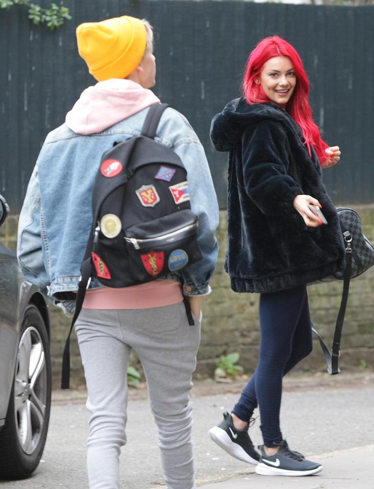  Joe Smitten Dianne Buswell and Joe Sugg put on cosy display as they make their way to rehearsals for Strictly tour