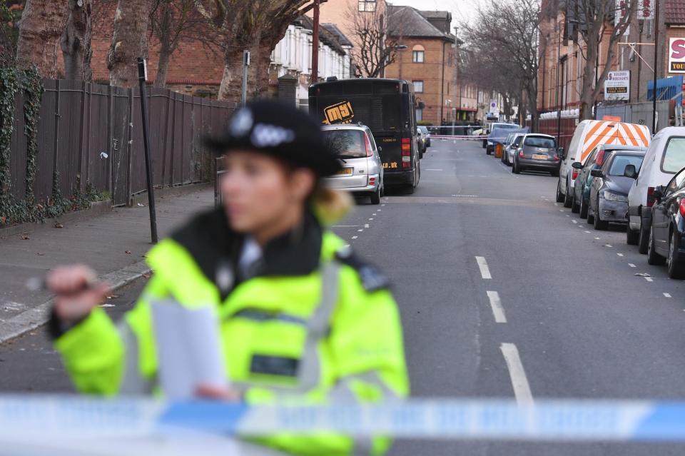  An officer stands guard at the scene where the boy died, just 40 minutes after being hit by the car