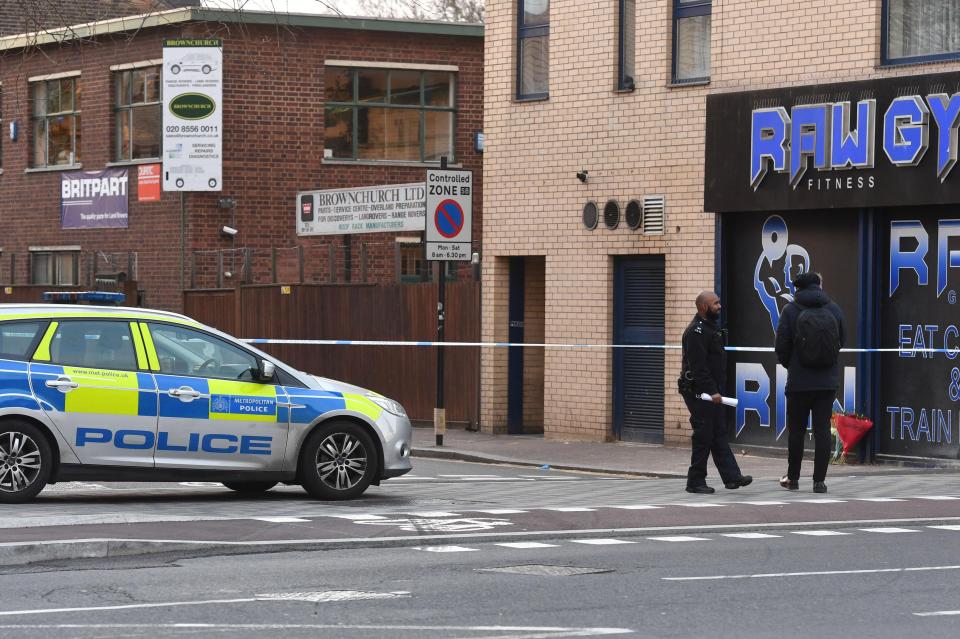  Officers remain at the scene as a murder investigation was launched