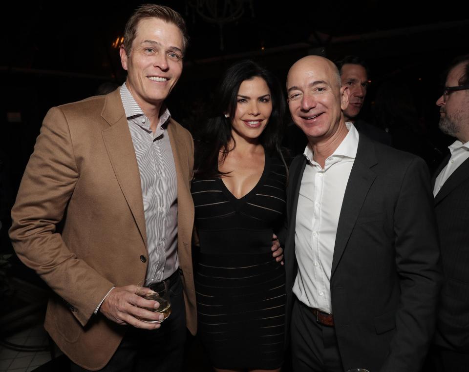  Jeff Bezos, right, pictured with Lauren Sanchez and her estranged husband Hollywood mogul Patrick Whitesell