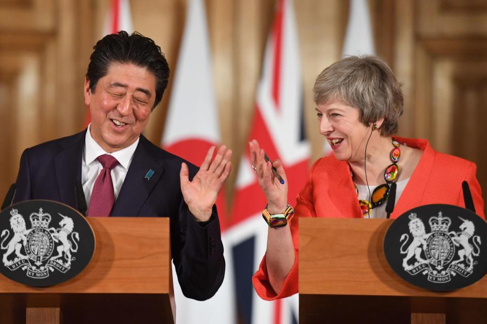  Theresa May has been phoning union leaders today to beg them for support - as she charmed Japanese PM Shinzo Abe too