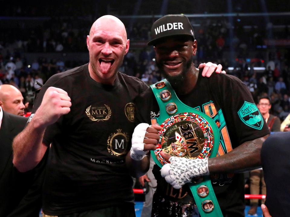  Tyson Fury and Deontay Wilder have been ordered to figure out a deal