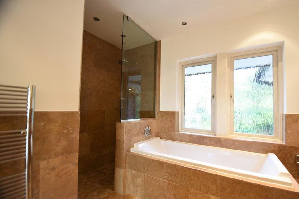  There are multiple bathrooms with baths and showers within the £3.25m property