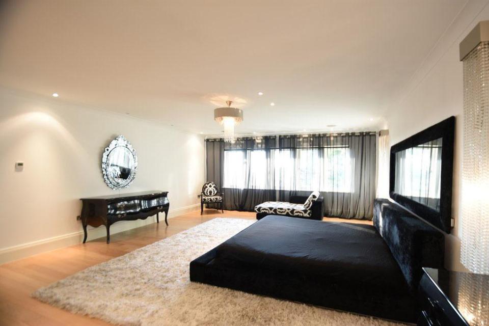  This is one of five bedrooms within the sprawling mansion