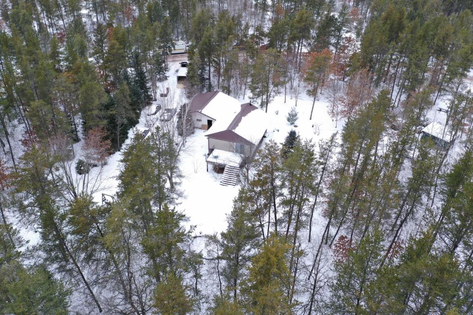  An aerial shot of Patterson's eerie forest cabin where he allegedly held