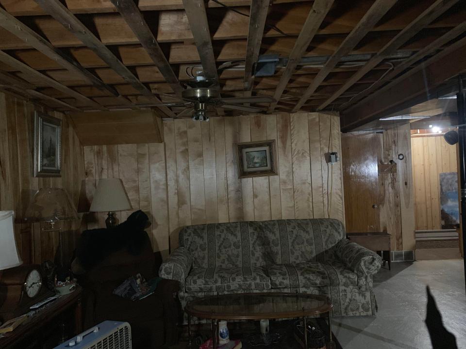  The cabin is filled with an assortment of tatty old furniture, from rocking chairs to fans and years-old televisions and stereos