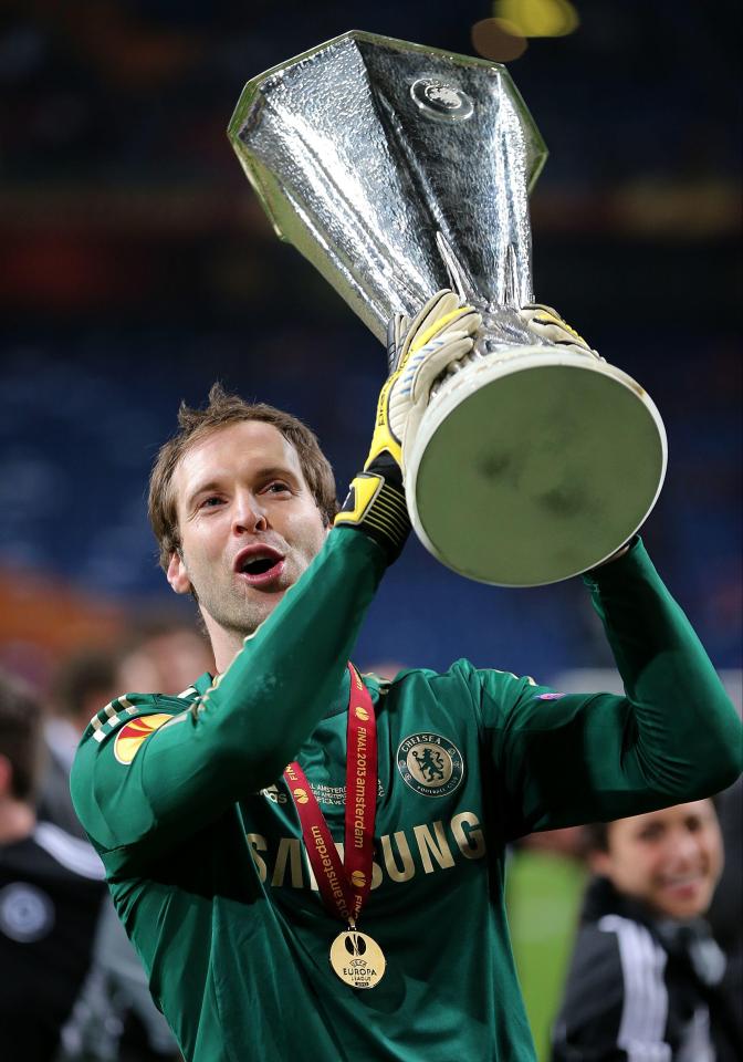  The Czech international holds the Europa League aloft