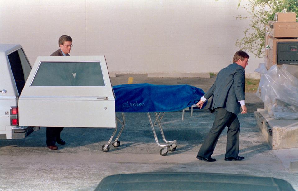  The body of Bundy is taken to the Alachua County Medical Examiner's office following his execution