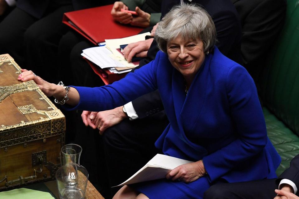 Theresa May survives a no-confidence vote a day after a historic Commons defeat over her Brexit deal