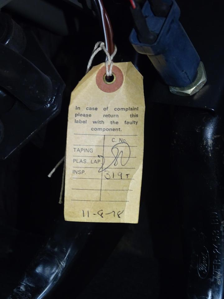  A tag shows the period build tag fitted to cars in the seventies