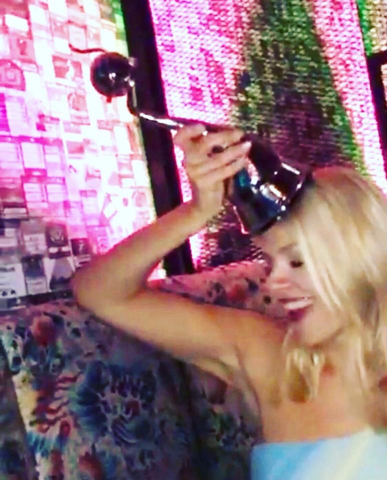  Holly shared a boozy throwback snap from last year's NTAs on Instagram today