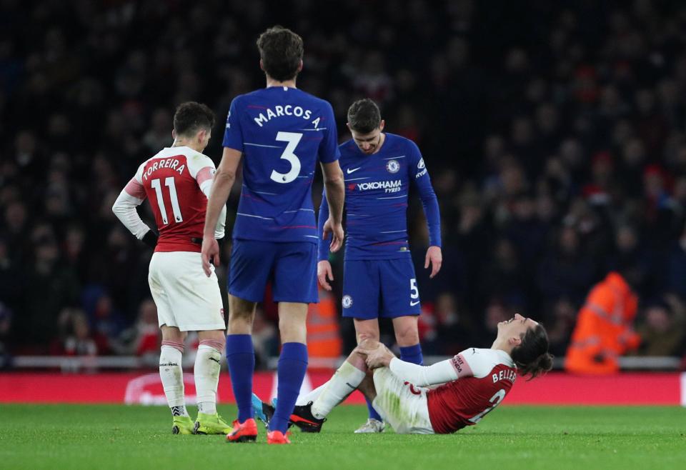 Hector Bellerin writhes in agony after injuring his leg