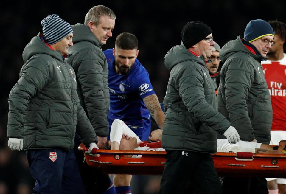 Hector Bellerin was carried off the pitch on a stretcher against Chelsea