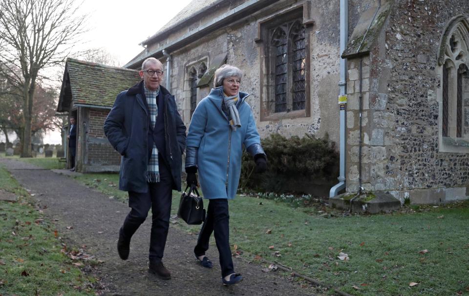  Theresa May with her husband going to church this morning