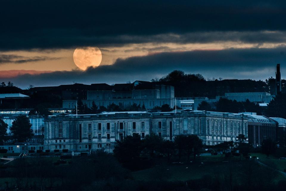  The first full moon of 2019 is seen rising over the National Library of Wales in Aberystwyth Wales