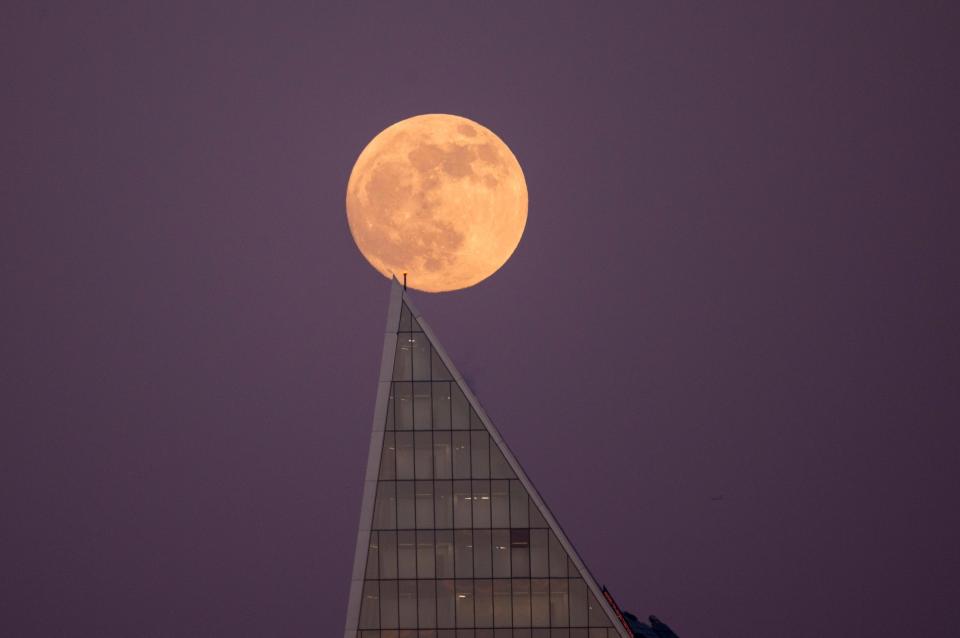  The Supermoon rises over the City of London