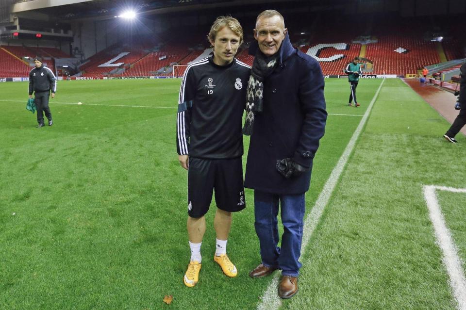  Terry Nelson (right) poses with Real Madrid star Luka Modric at Anfield