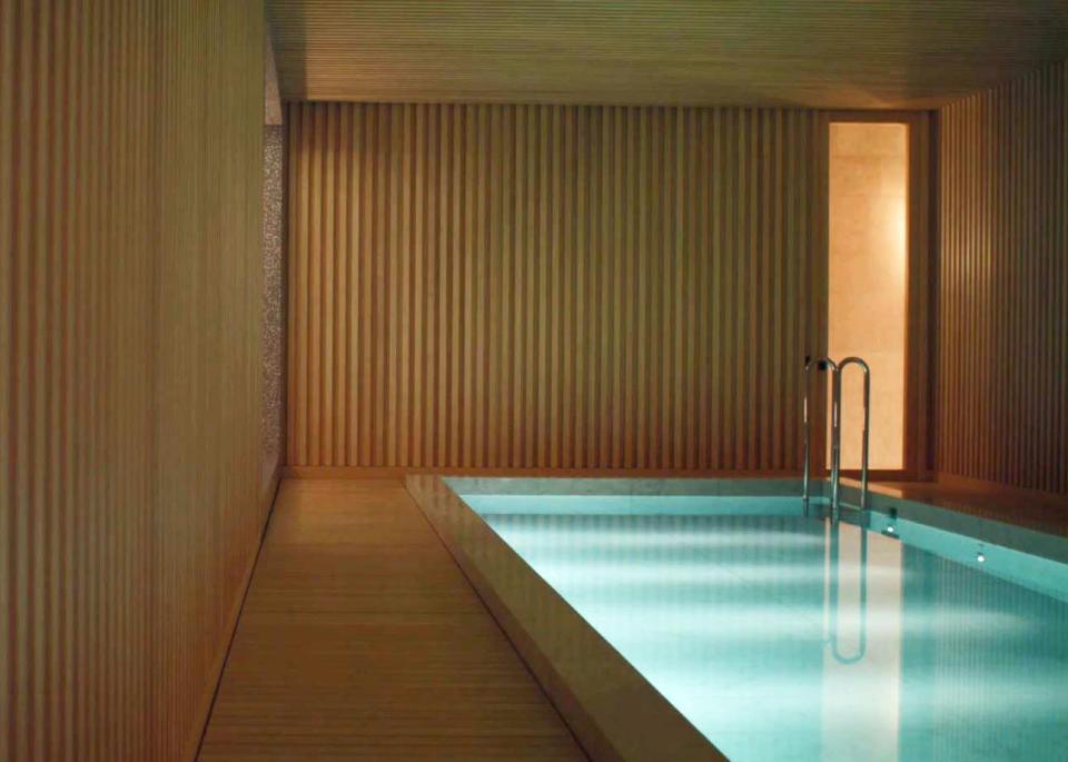  The luxurious house includes a stunning minimalistic indoor pool